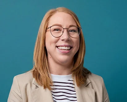 Woman smiling.