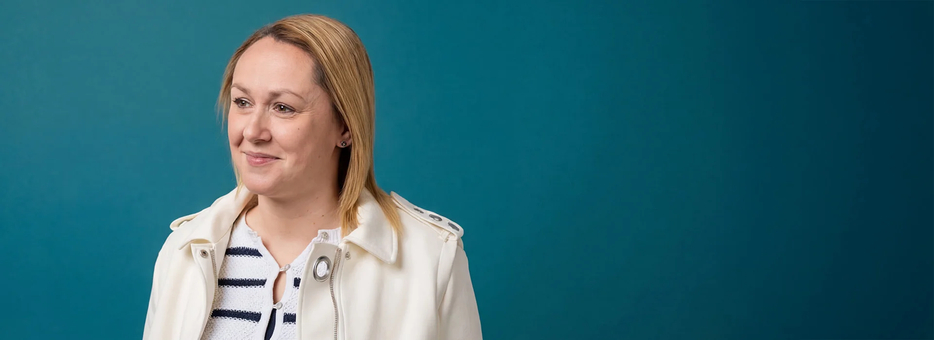 Woman smiling.