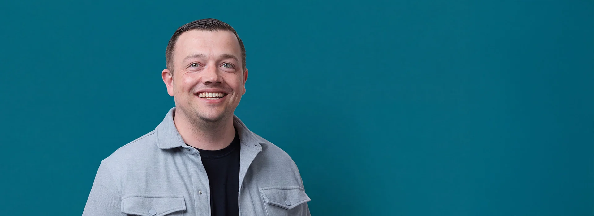Man smiling.