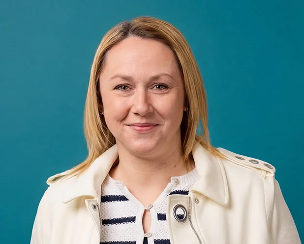 Woman smiling.