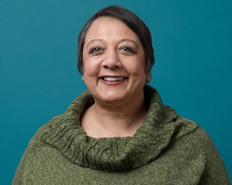 Woman smiling.