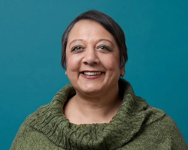 Woman smiling.