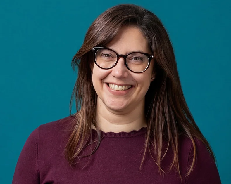 Woman smiling.