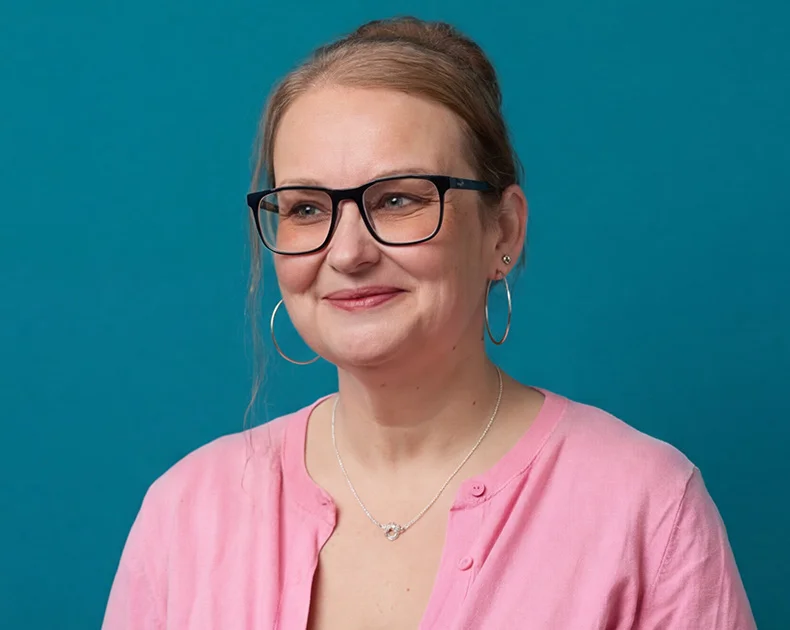 Woman smiling.