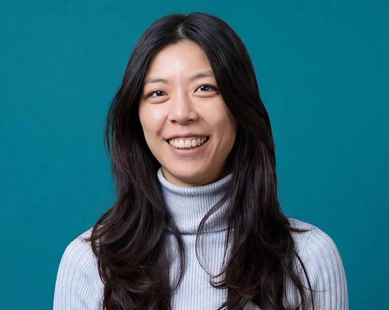 Woman smiling.