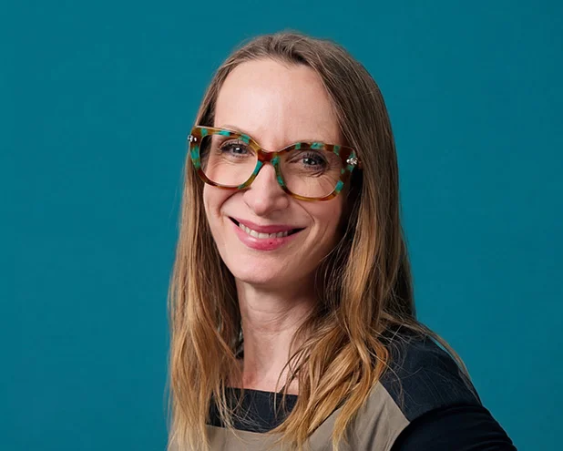 Woman smiling.