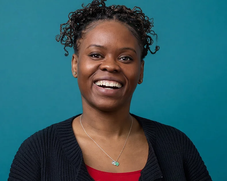 Woman smiling.