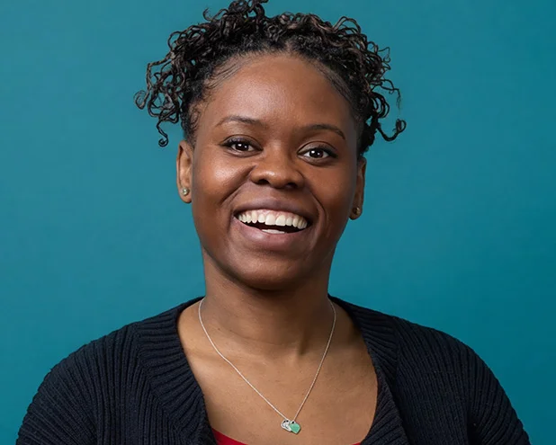 Woman smiling.