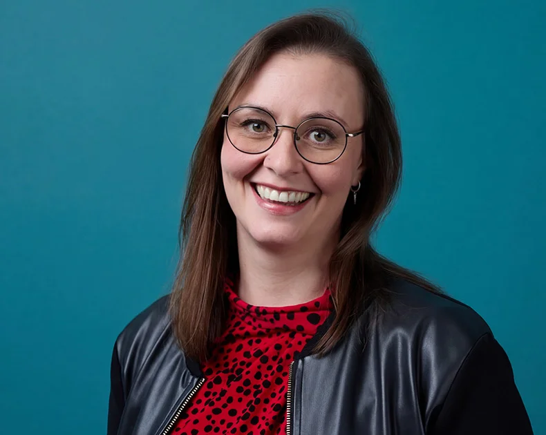Woman smiling.
