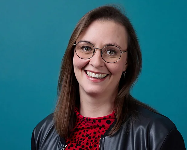 Woman smiling.