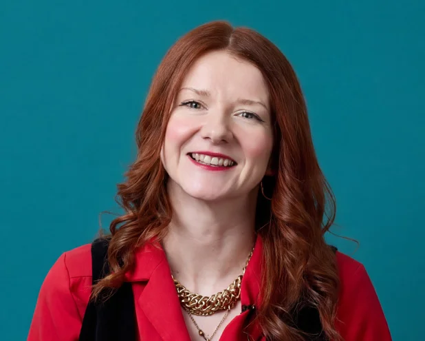 Woman smiling.