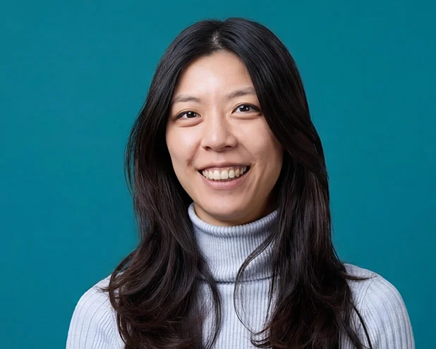Woman smiling.